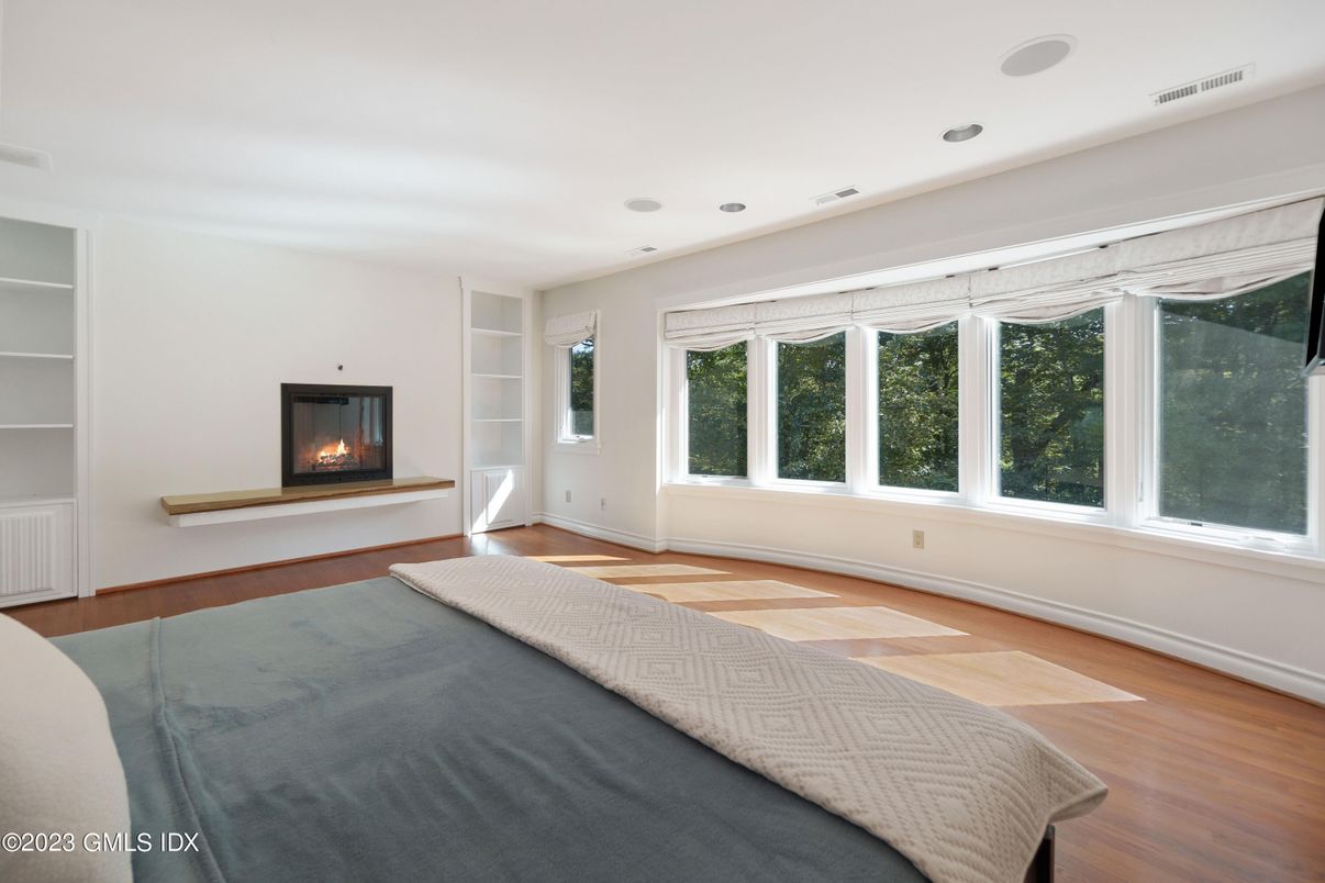 Bedroom, Fireplace, Interior, Recessed Lighting, Wood Texture Flooring