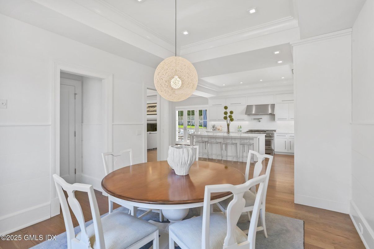 Dining room, Interior, Kitchen, Pendant Lights, Recessed Lighting, Stainless Steel Appliances, Wood Texture Flooring