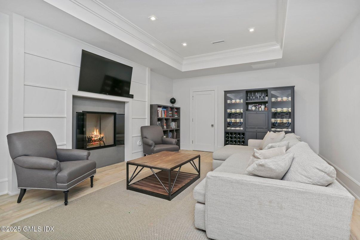 Fireplace, Interior, Living room, Recessed Lighting, Wood Texture Flooring