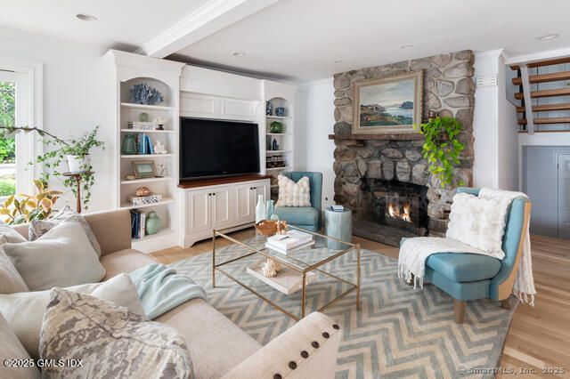 Fireplace, Interior, Living room, Recessed Lighting, Stone Walls, Wood Texture Flooring