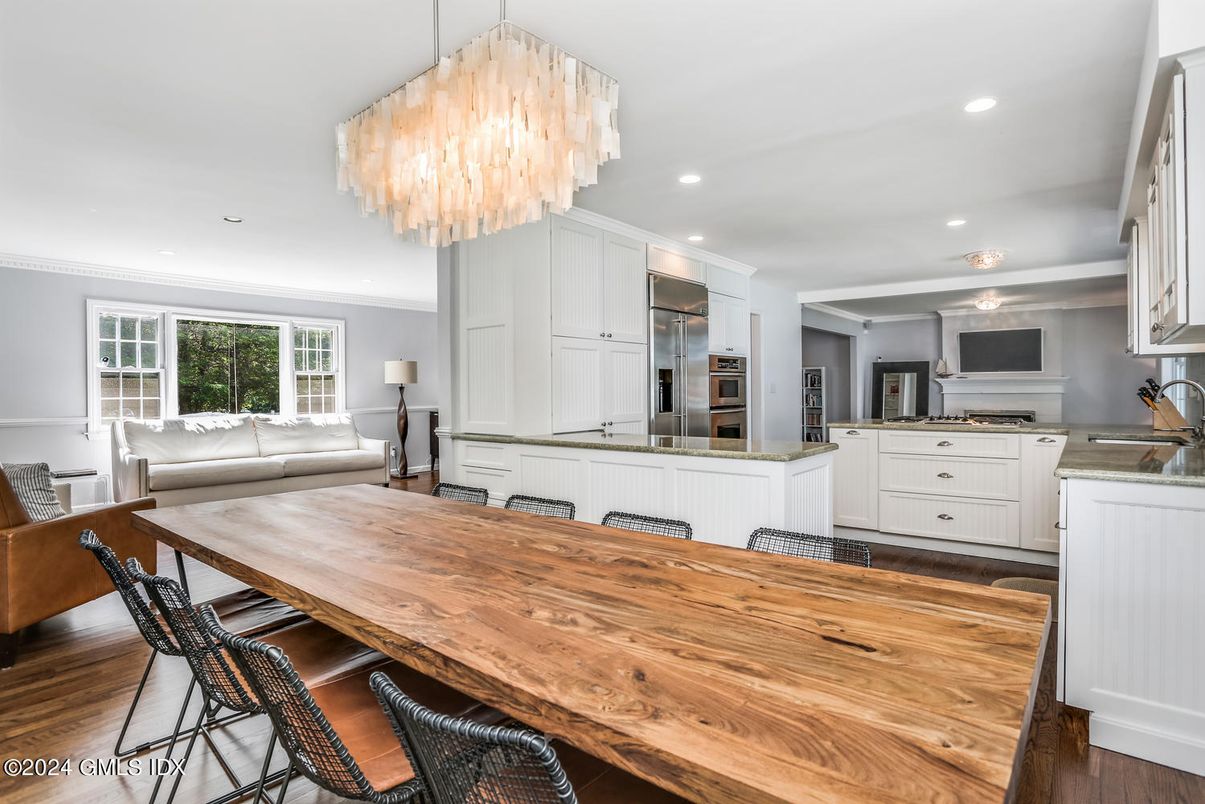 Chandelier, Dining room, Interior, Kitchen, Living room, Recessed Lighting, Stainless Steel Appliances, Wood Texture Flooring