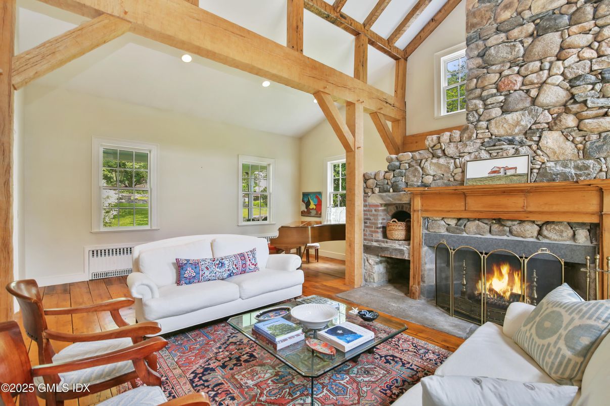 Fireplace, Interior, Living room, Recessed Lighting, Stone Walls, Wooden Beams, Wood Texture Flooring