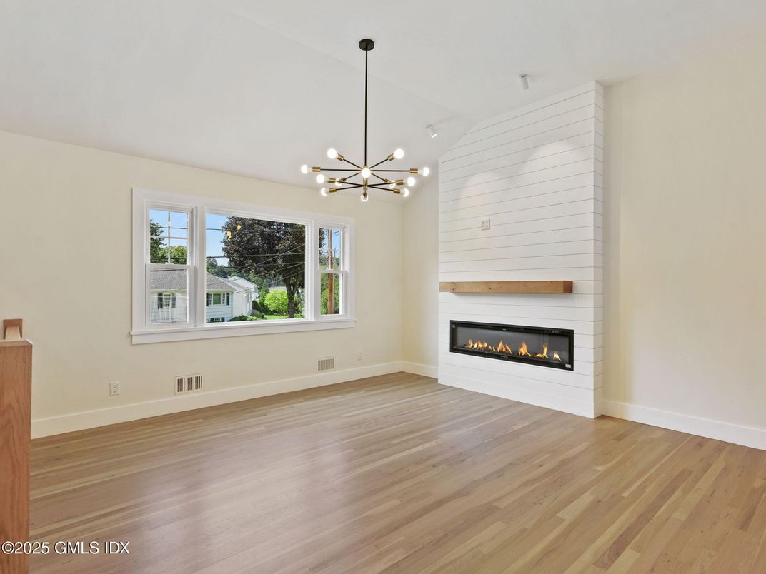 Empty room, Fireplace, Interior, Pendant Lights, Wood Texture Flooring