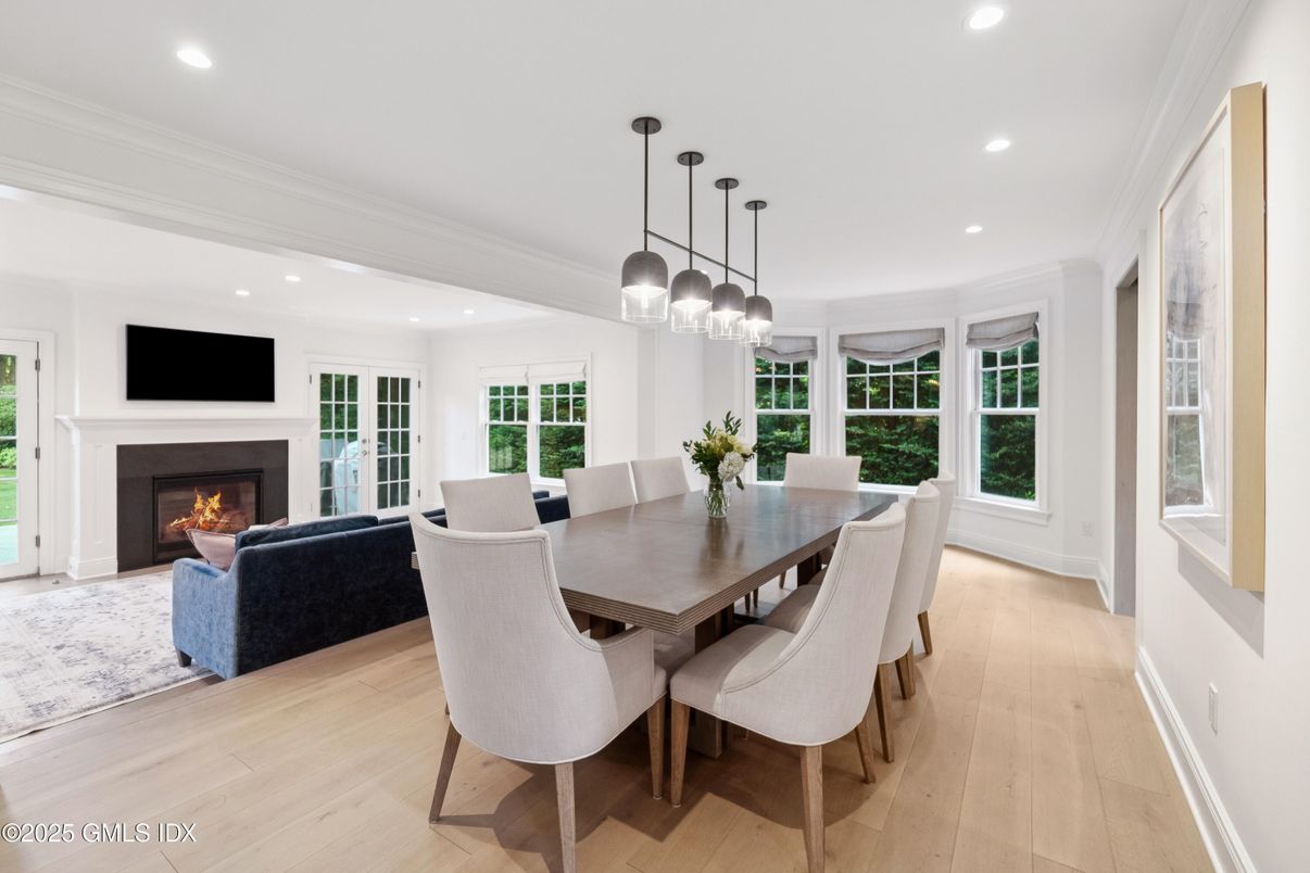 Dining room, Fireplace, Interior, Living room, Pendant Lights, Recessed Lighting, Wood Texture Flooring