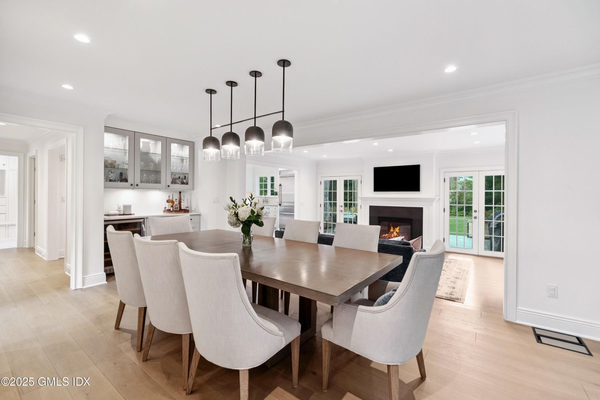 Dining room, Fireplace, Interior, Pendant Lights, Recessed Lighting, Wood Texture Flooring