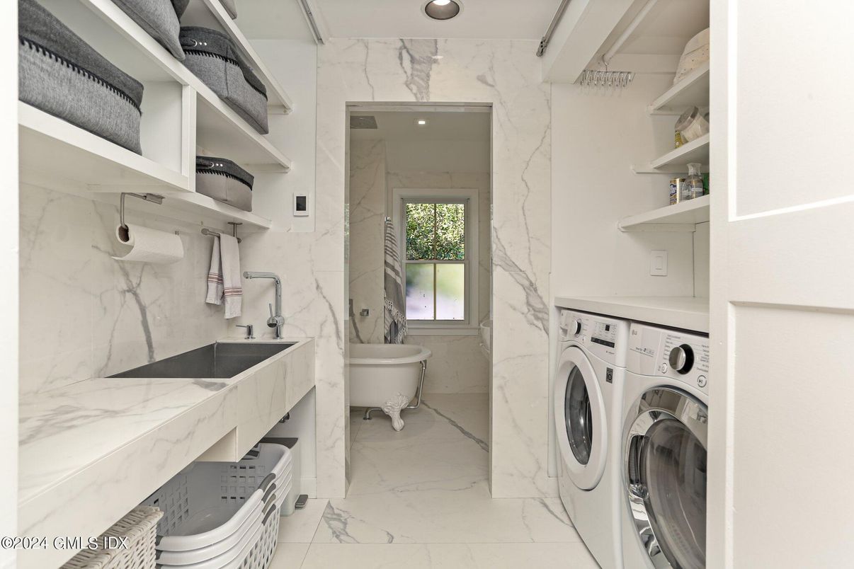 Bathroom, Interior, Marble, Marble Walls, Recessed Lighting, Utility Closets, Washer