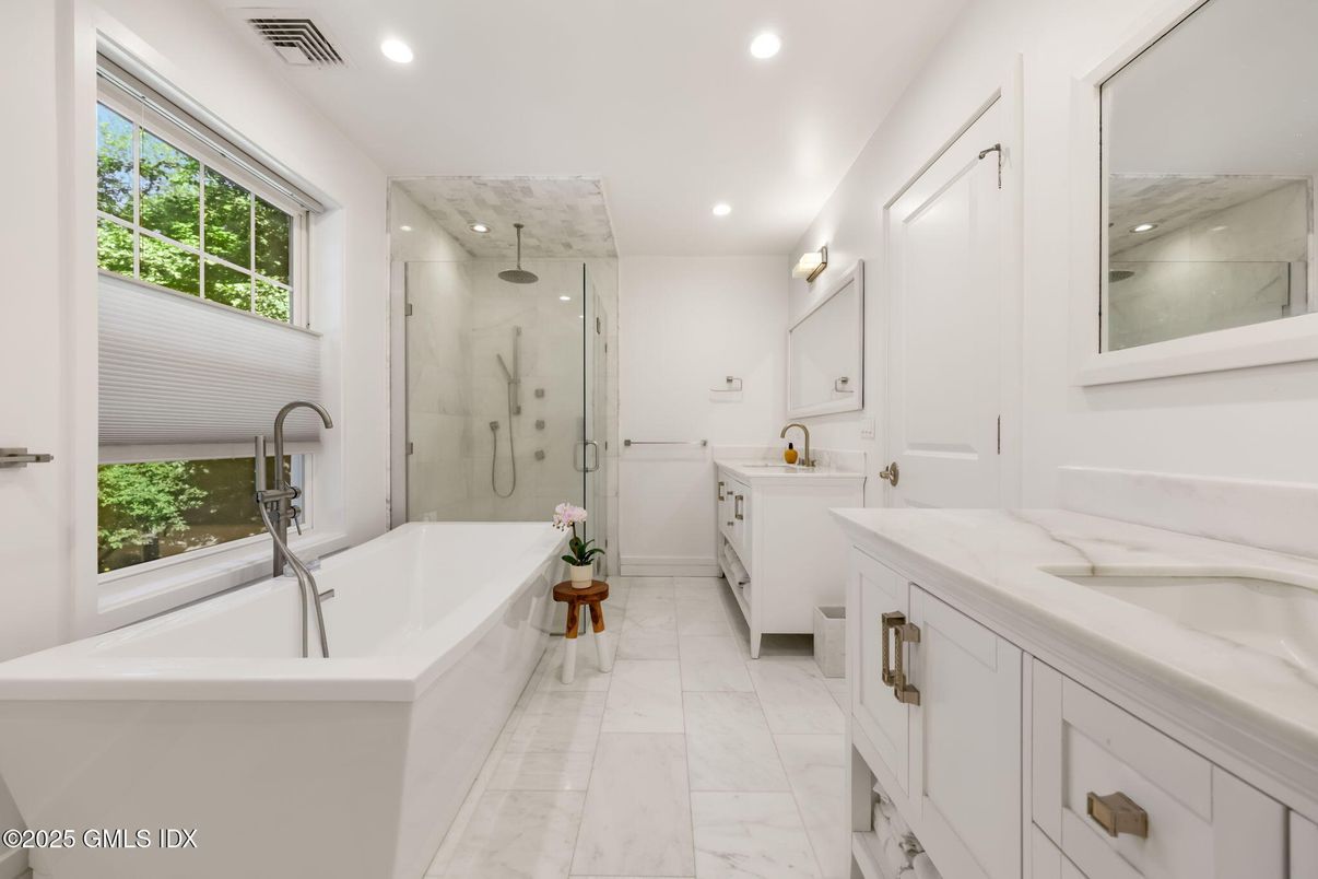 Bathroom, Dual Sink Vanities, Free Standing Baths, Glass Shower, Interior, Marble, Marble Walls, Recessed Lighting