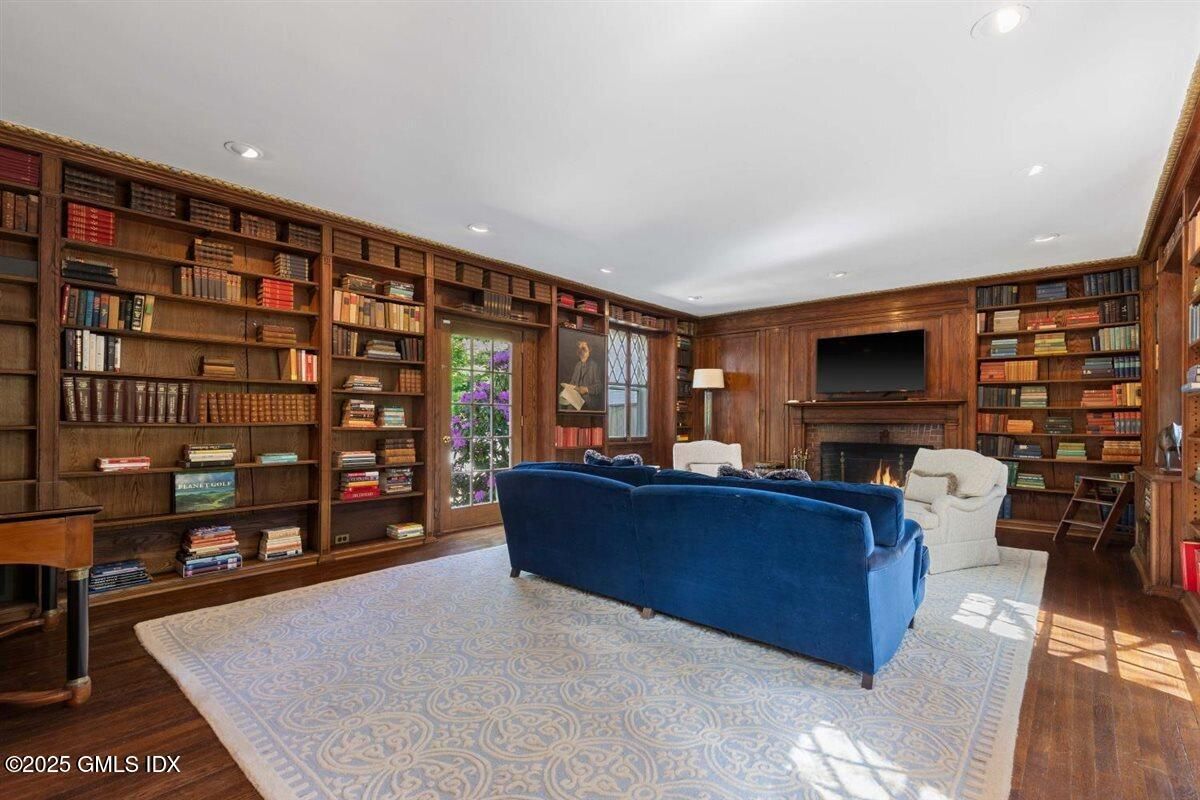 Fireplace, Interior, Living room, Recessed Lighting, Wood Texture Flooring, Wooden Walls