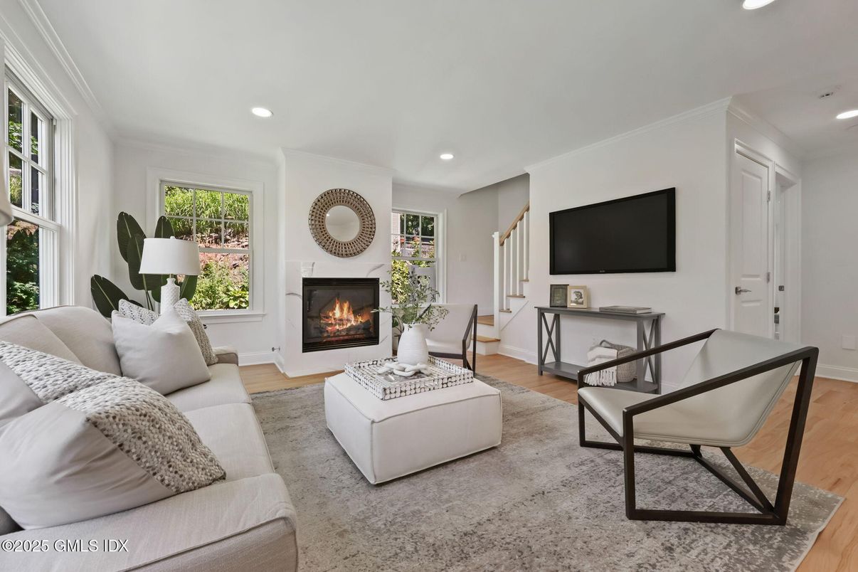 Fireplace, Interior, Living room, Recessed Lighting, Wood Texture Flooring