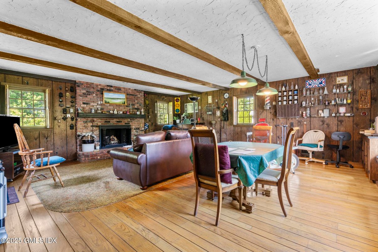 Dining room, Fireplace, Interior, Living room, Pendant Lights, Stone Walls, Wooden Beams, Wood Texture Flooring, Wooden Walls