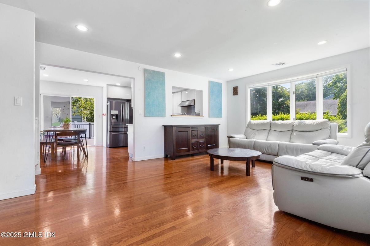 Dining room, Interior, Kitchen, Living room, Recessed Lighting, Stainless Steel Appliances, Wood Texture Flooring