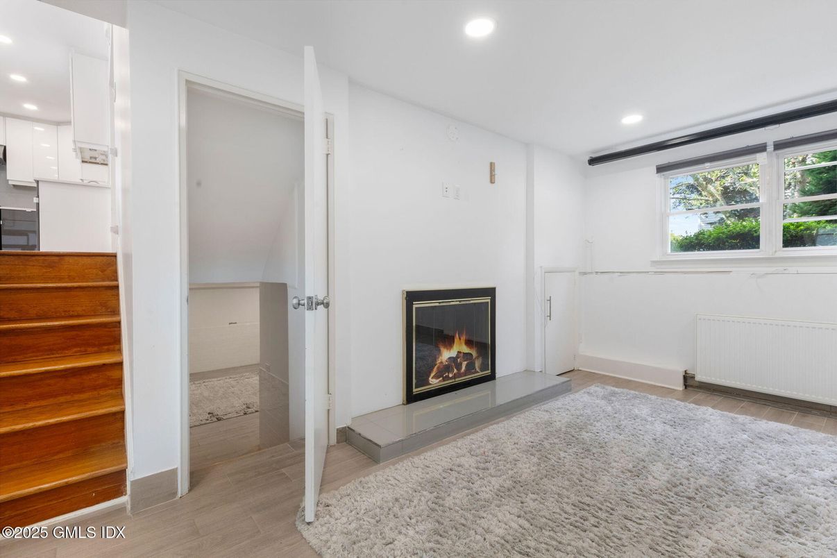 Fireplace, Interior, Recessed Lighting, Wood Texture Flooring