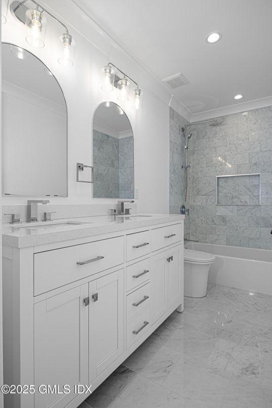 Bathroom, Dual Sink Vanities, Interior, Marble, Marble Walls, Recessed Lighting