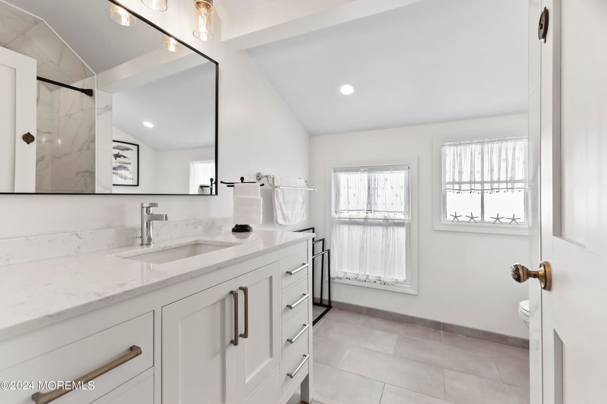 Bathroom, Dual Sink Vanities, Interior, Marble Walls, Recessed Lighting