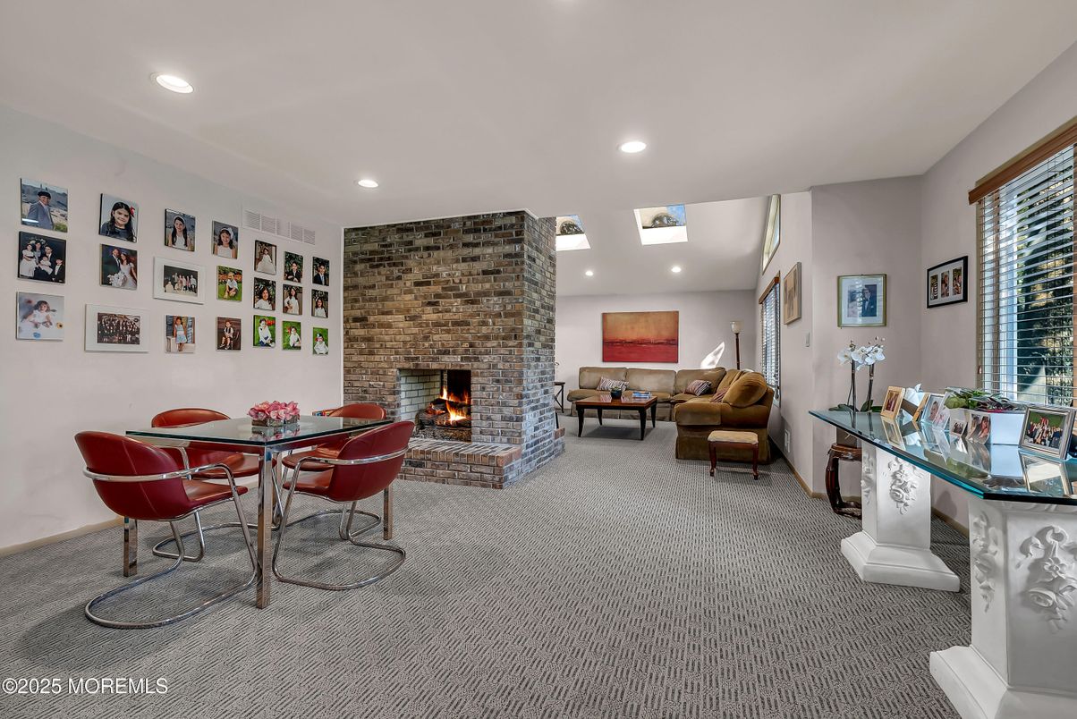 Dining room, Fireplace, Interior, Living room, Recessed Lighting, Stone Walls