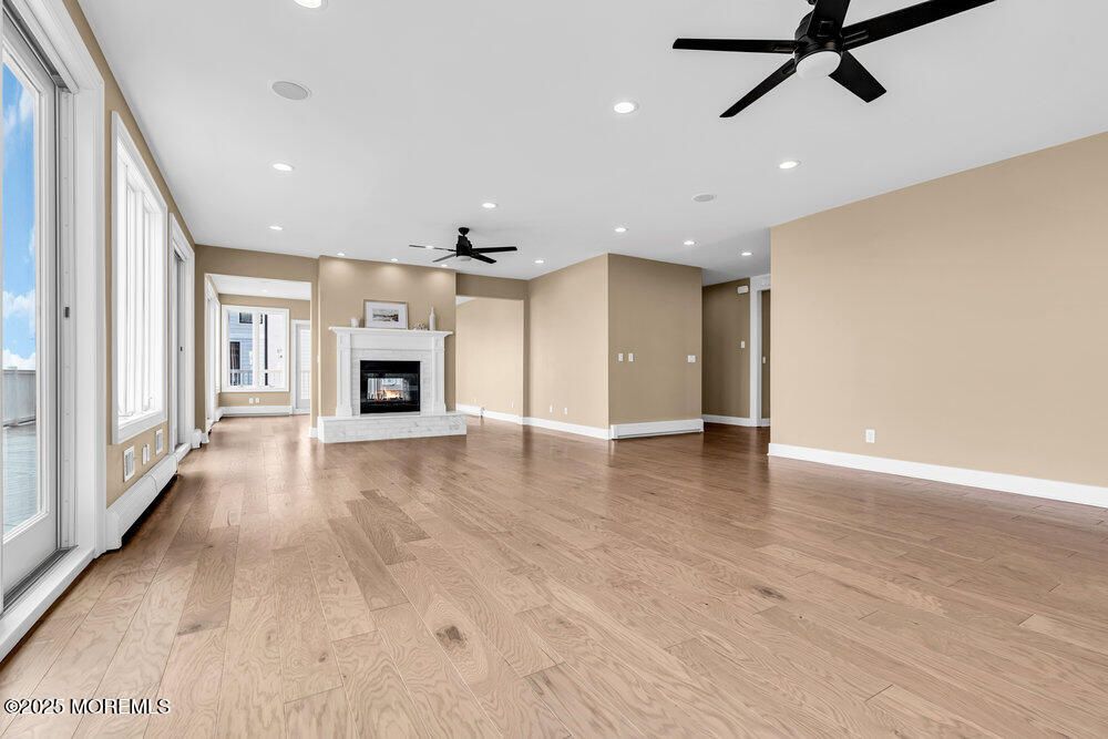 Empty room, Fireplace, Interior, Recessed Lighting, Wood Texture Flooring
