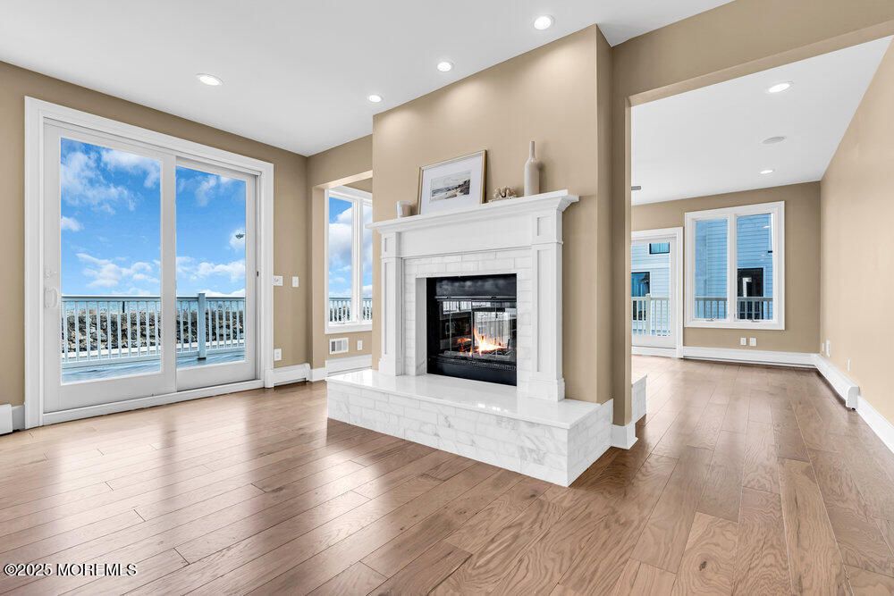 Fireplace, Interior, Recessed Lighting, Water, Wood Texture Flooring