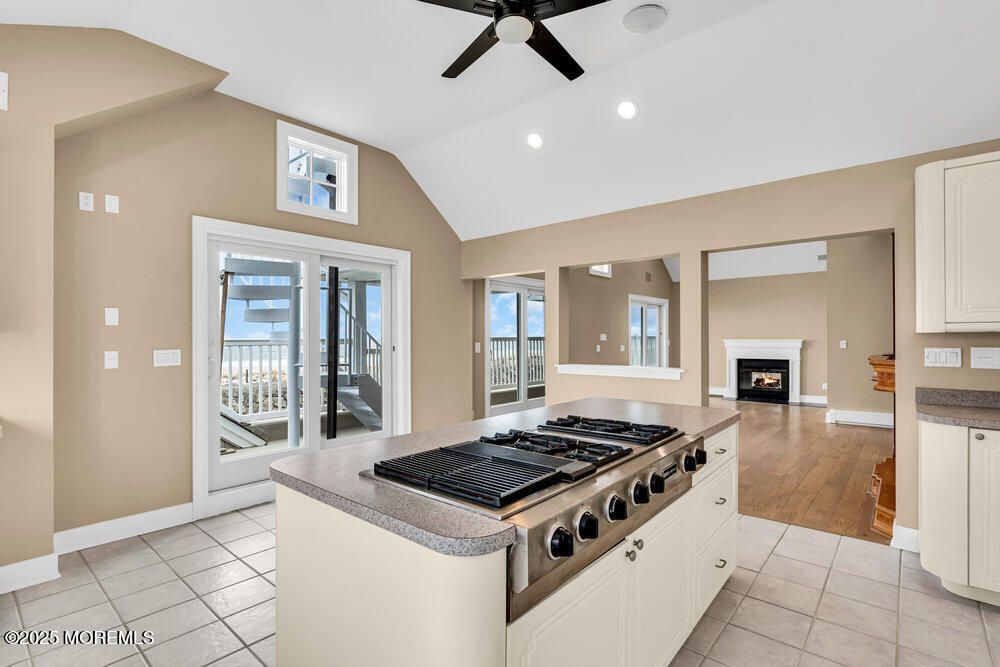 Fireplace, Interior, Kitchen, Recessed Lighting, Wood Texture Flooring