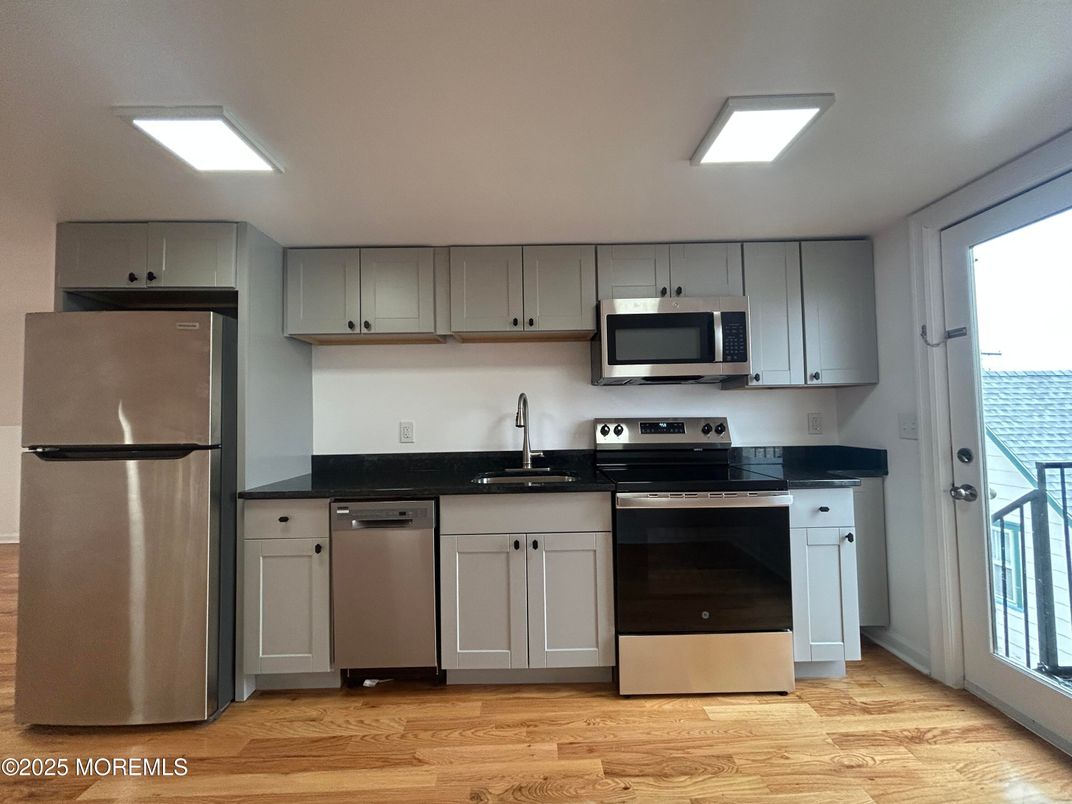 Interior, Kitchen, Recessed Lighting, Stainless Steel Appliances, Wood Texture Flooring