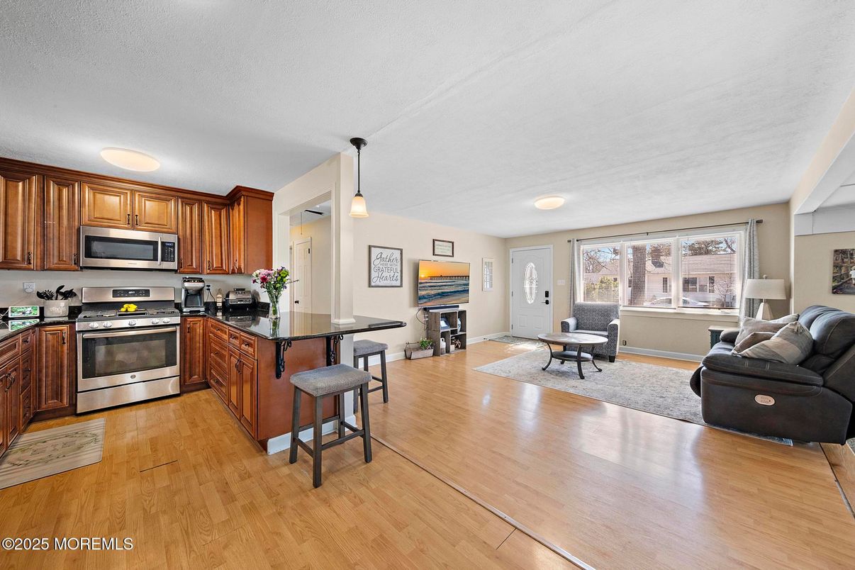 Dining room, Interior, Kitchen, Living room, Pendant Lights, Stainless Steel Appliances, Wood Texture Flooring