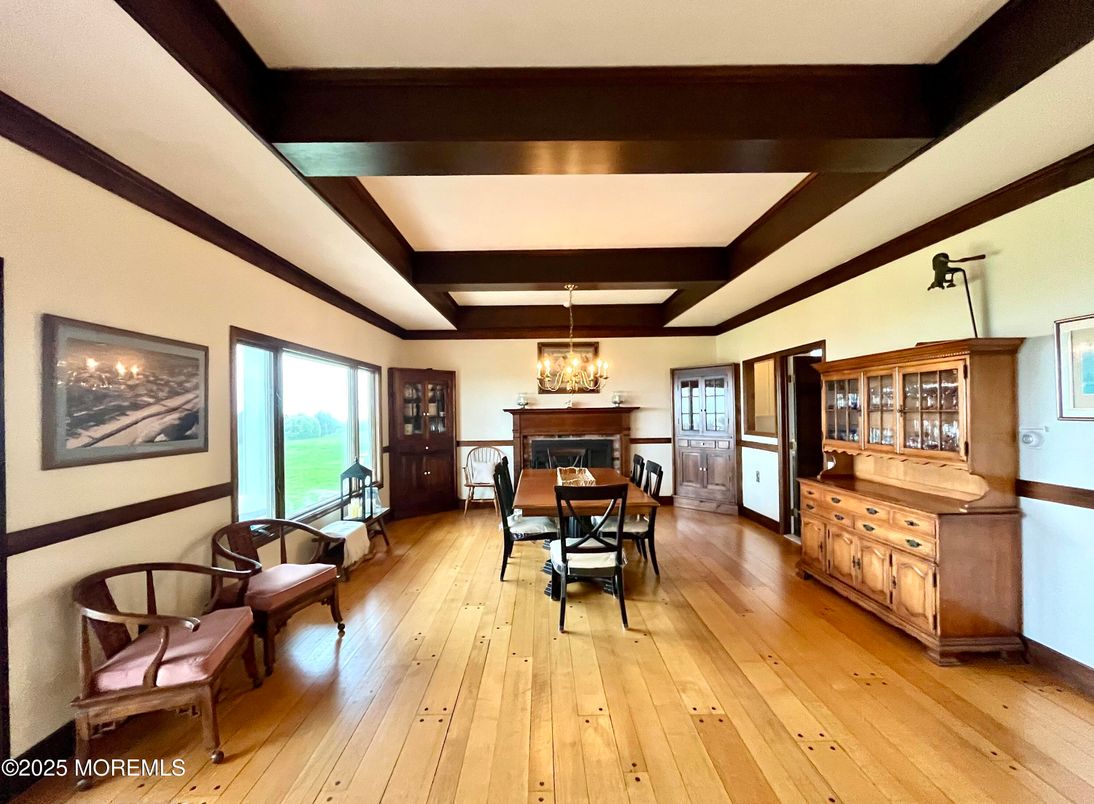 Chandelier, Dining room, Fireplace, Interior, Wooden Beams, Wood Texture Flooring