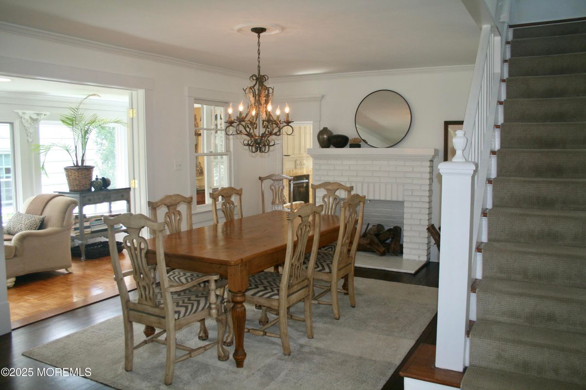 Chandelier, Dining room, Fireplace, Interior, Wood Texture Flooring