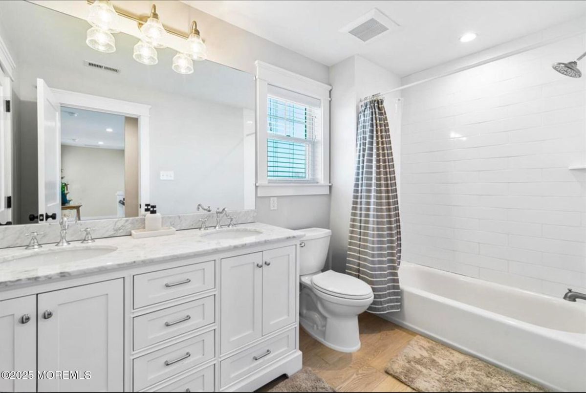Bathroom, Dual Sink Vanities, Interior, Recessed Lighting, Wood Texture Flooring