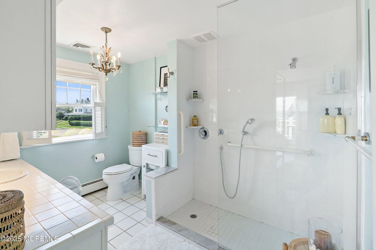 Bathroom, Chandelier, Glass Shower, Interior, Tile Countertops
