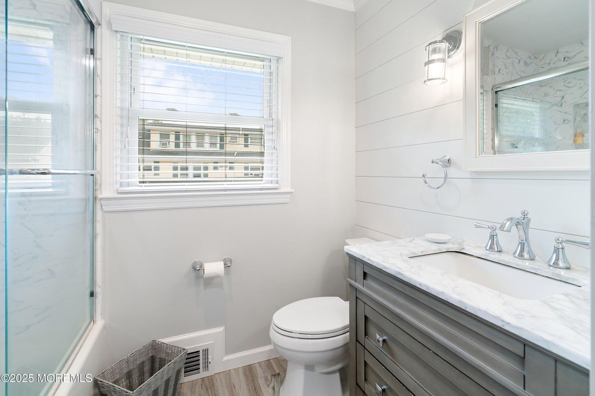 Bathroom, Glass Shower, Interior, Marble Walls, Wood Texture Flooring