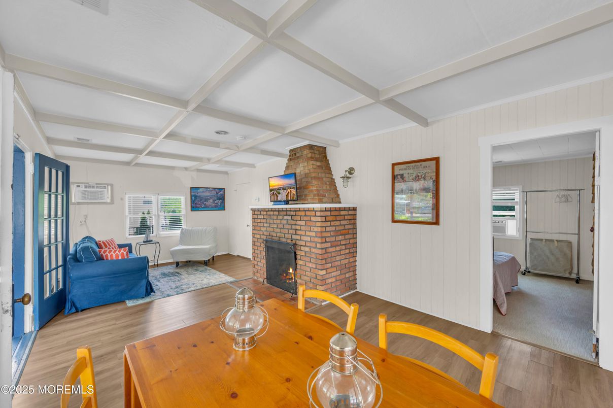 Dining room, Fireplace, Interior, Living room, Wood Texture Flooring