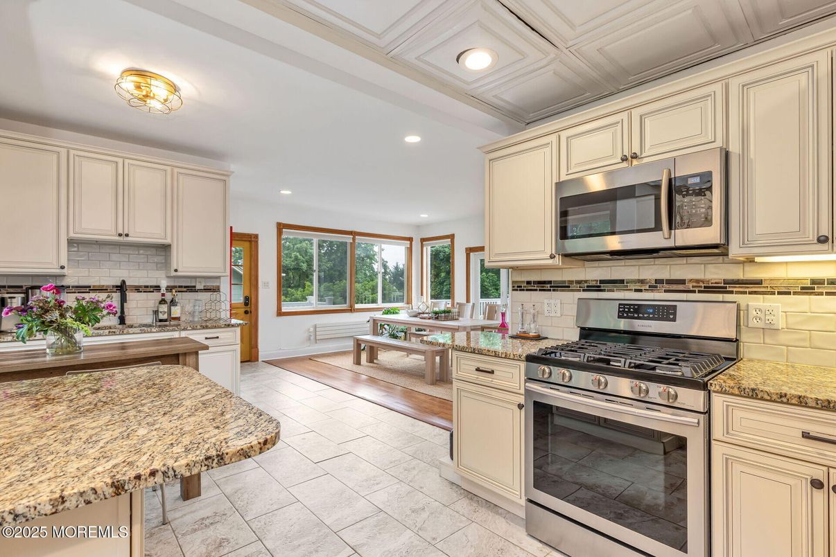 Dining room, Interior, Kitchen, Recessed Lighting, Stainless Steel Appliances, Wood Texture Flooring