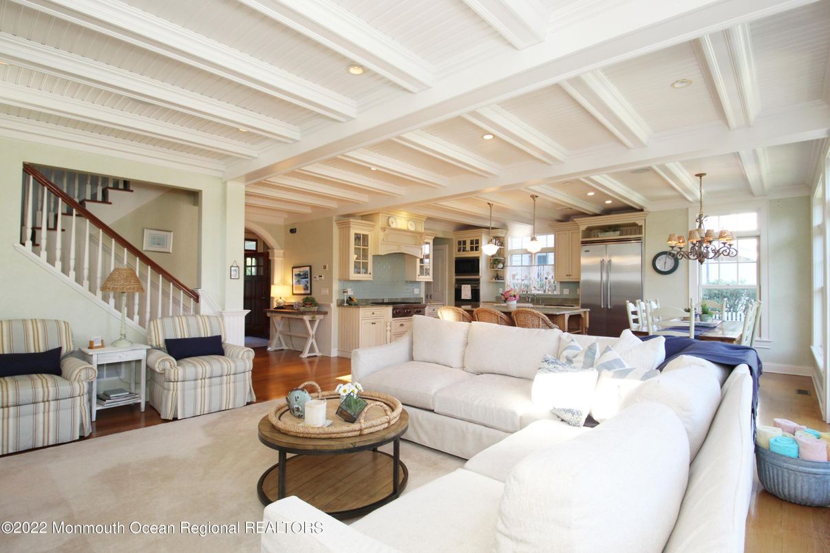 Chandelier, Dining room, Interior, Kitchen, Living room, Pendant Lights, Recessed Lighting, Stainless Steel Appliances, Wood Texture Flooring
