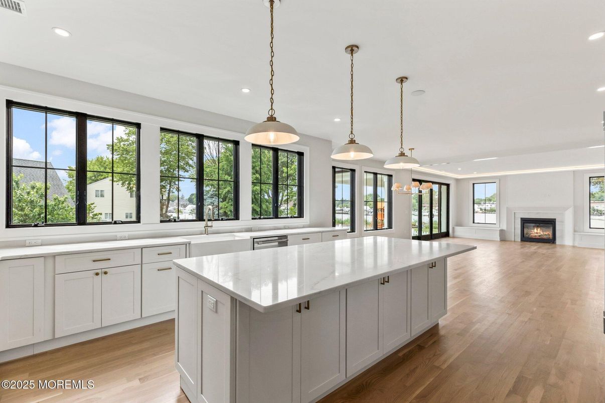 Fireplace, Interior, Kitchen, Pendant Lights, Recessed Lighting, Wood Texture Flooring