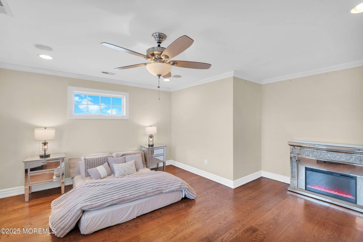 Bedroom, Fireplace, Interior, Recessed Lighting, Wood Texture Flooring