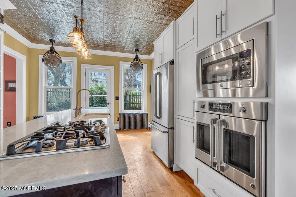 Interior, Kitchen, Pendant Lights, Stainless Steel Appliances, Wood Texture Flooring