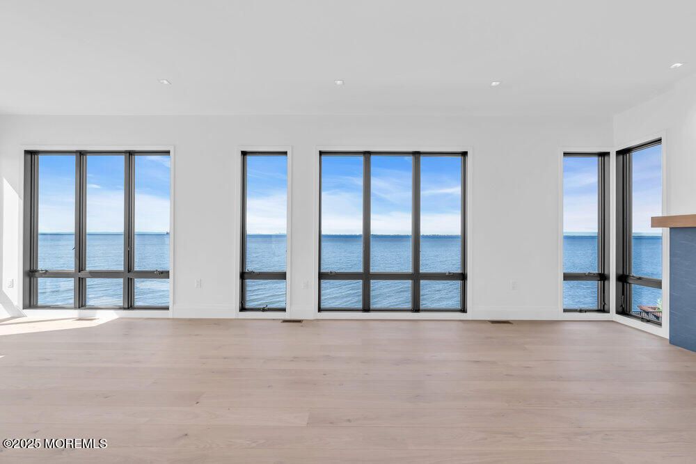 Empty room, Fireplace, Interior, Recessed Lighting, Water, Wood Texture Flooring
