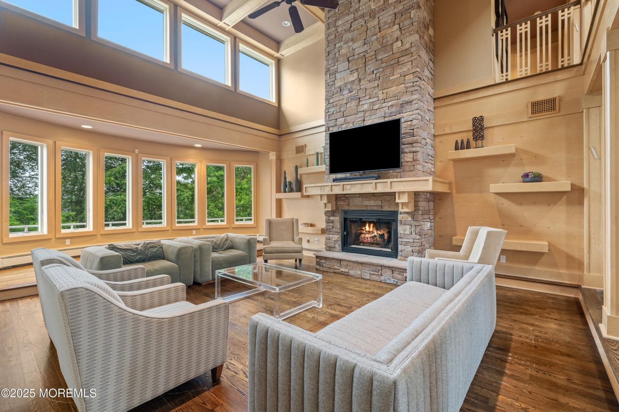 Fireplace, Interior, Living room, Recessed Lighting, Stone Walls, Wood Texture Flooring