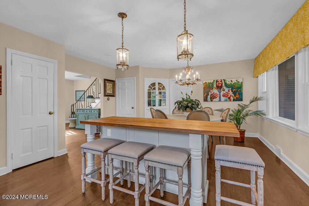Chandelier, Dining room, Interior, Pendant Lights, Wood Texture Flooring