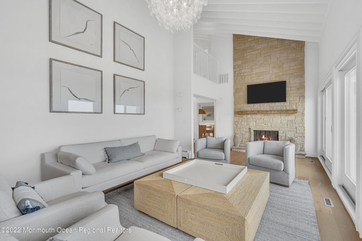 Chandelier, Fireplace, Interior, Living room, Stone Walls, Wood Texture Flooring