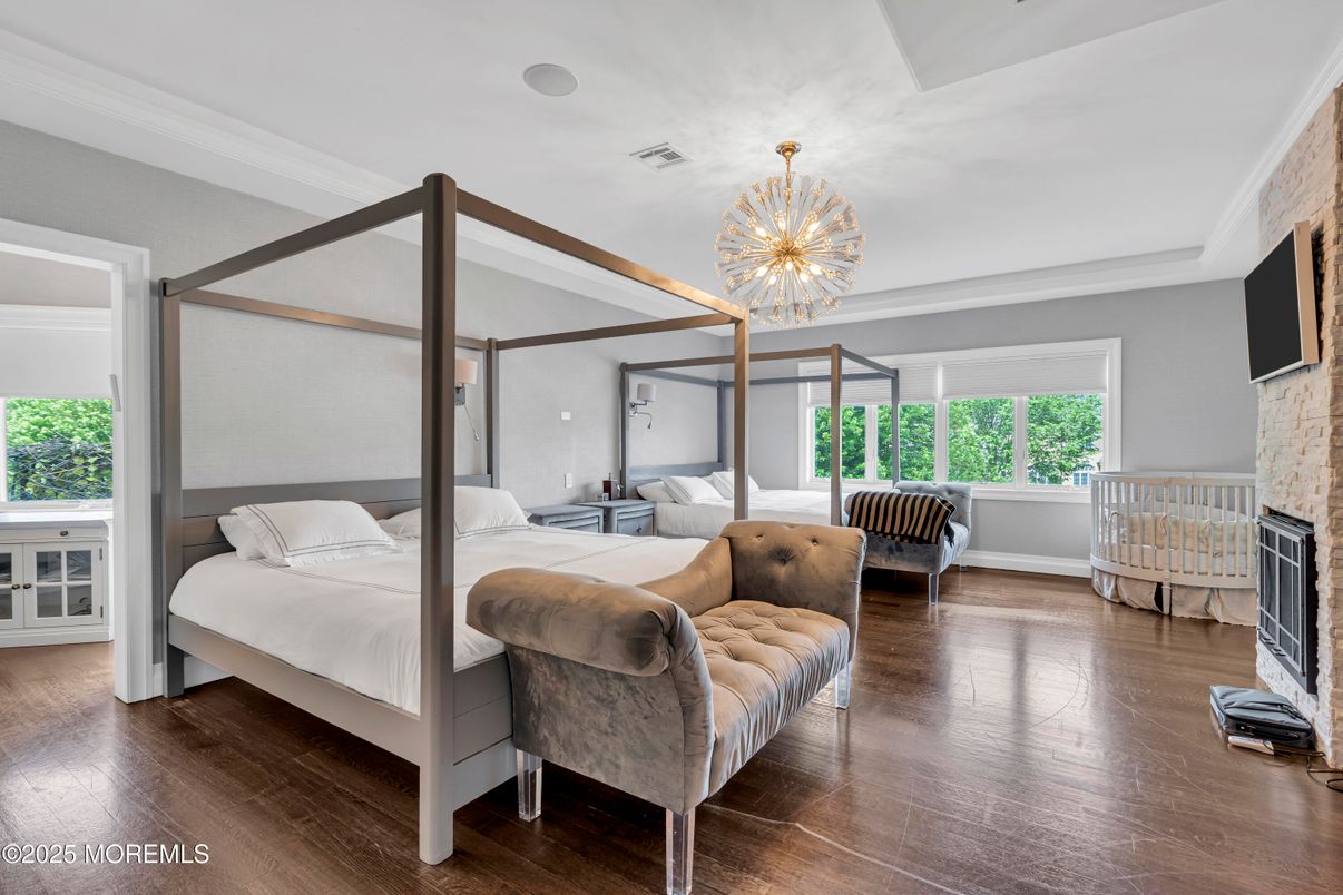 Bedroom, Chandelier, Fireplace, Interior, Pendant Lights, Wood Texture Flooring