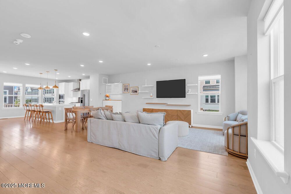 Dining room, Interior, Kitchen, Living room, Pendant Lights, Recessed Lighting, Stainless Steel Appliances, Wood Texture Flooring