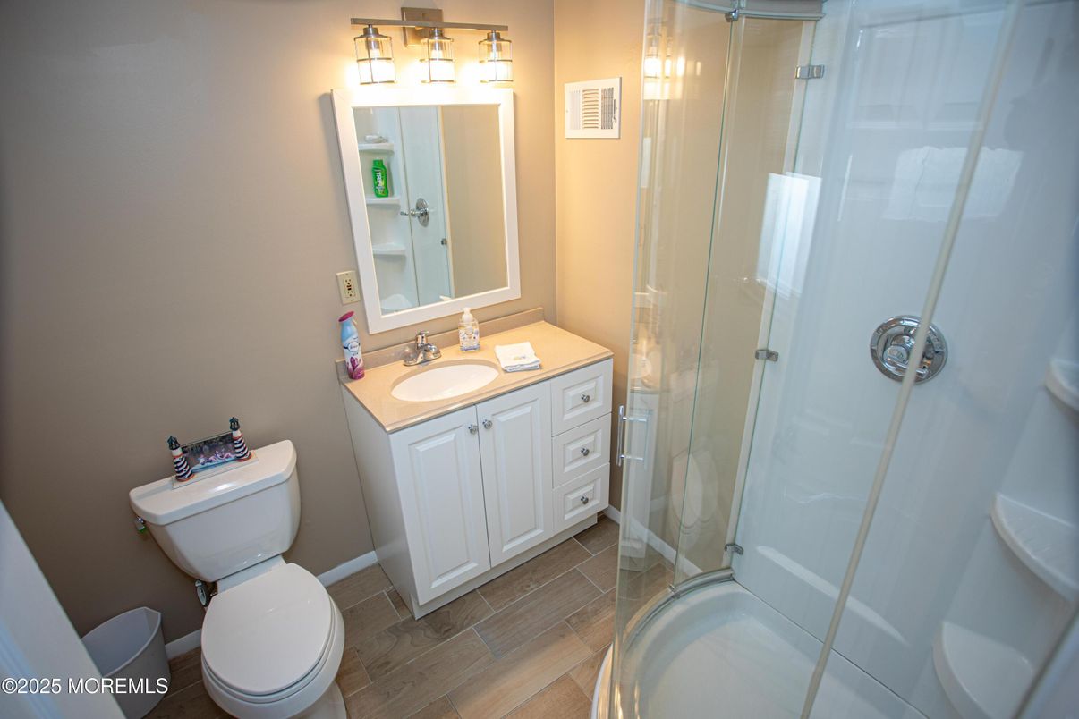 Bathroom, Glass Shower, Interior, Wood Texture Flooring