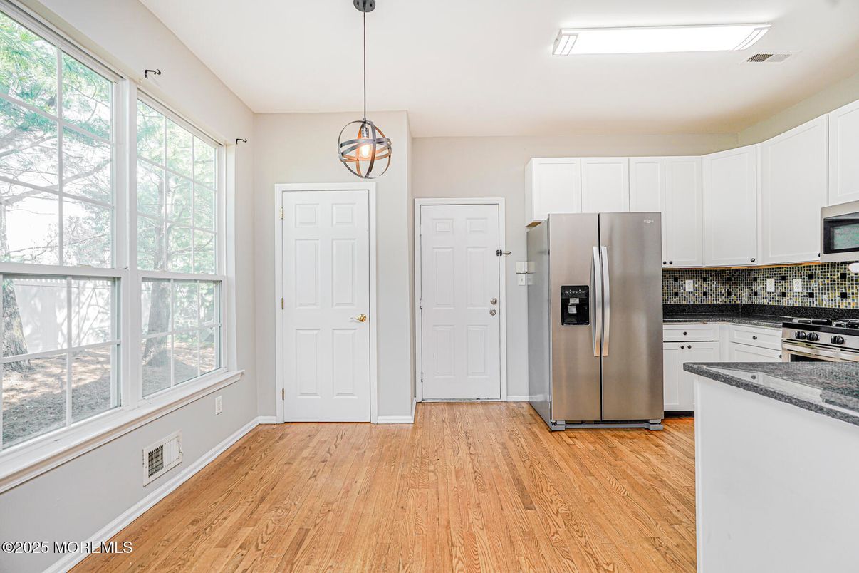 Interior, Kitchen, Pendant Lights, Stainless Steel Appliances, Wood Texture Flooring