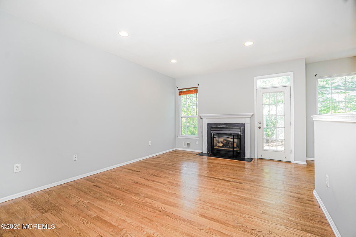 Empty room, Fireplace, Interior, Recessed Lighting, Wood Texture Flooring
