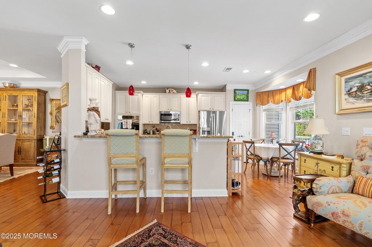 Dining room, Interior, Kitchen, Pendant Lights, Recessed Lighting, Stainless Steel Appliances, Wood Texture Flooring