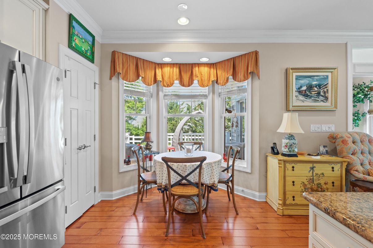 Dining room, Interior, Kitchen, Recessed Lighting, Stainless Steel Appliances, Wood Texture Flooring