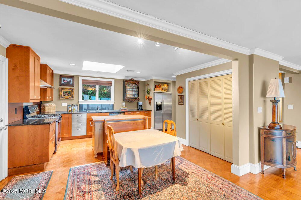 Dining room, Interior, Kitchen, Recessed Lighting, Stainless Steel Appliances, Wood Texture Flooring