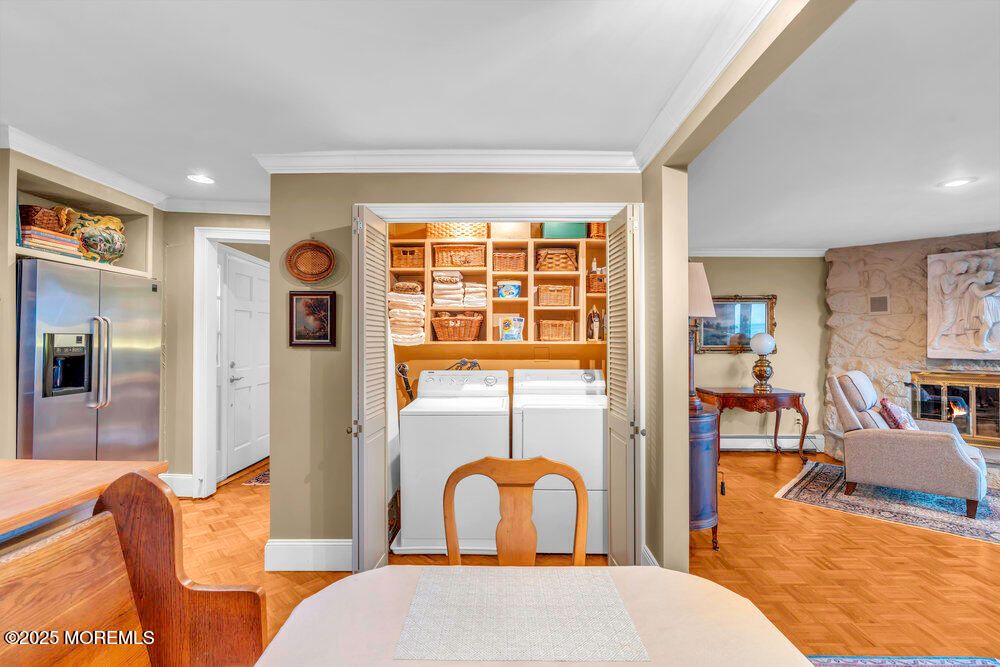 Fireplace, Interior, Recessed Lighting, Stone Walls, Utility Closets, Washer, Wood Texture Flooring