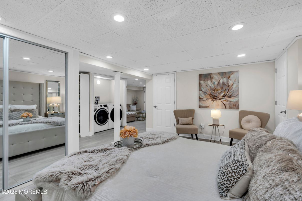 Bedroom, Interior, Recessed Lighting, Utility Closets, Washer, Wood Texture Flooring