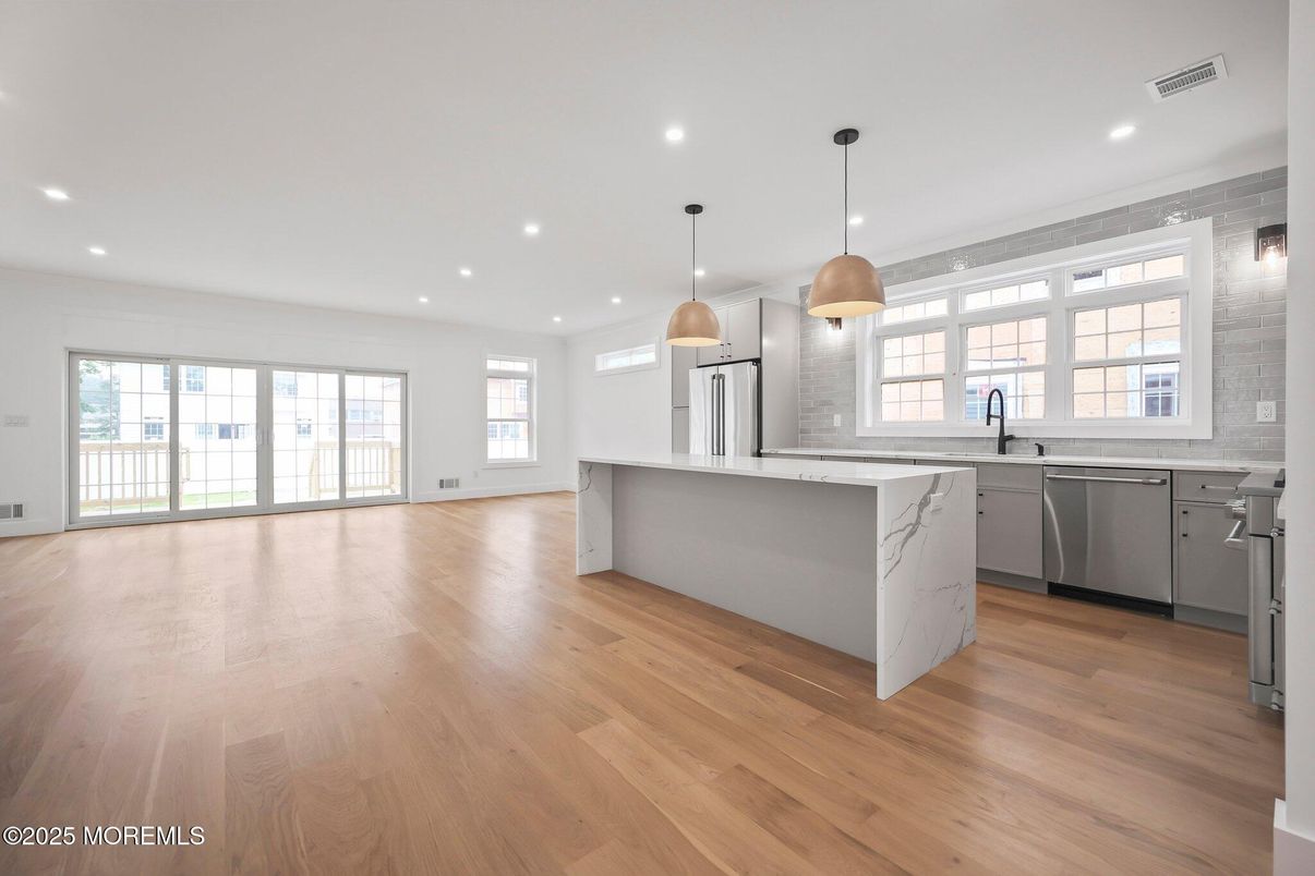 Interior, Kitchen, Pendant Lights, Recessed Lighting, Stainless Steel Appliances, Wood Texture Flooring